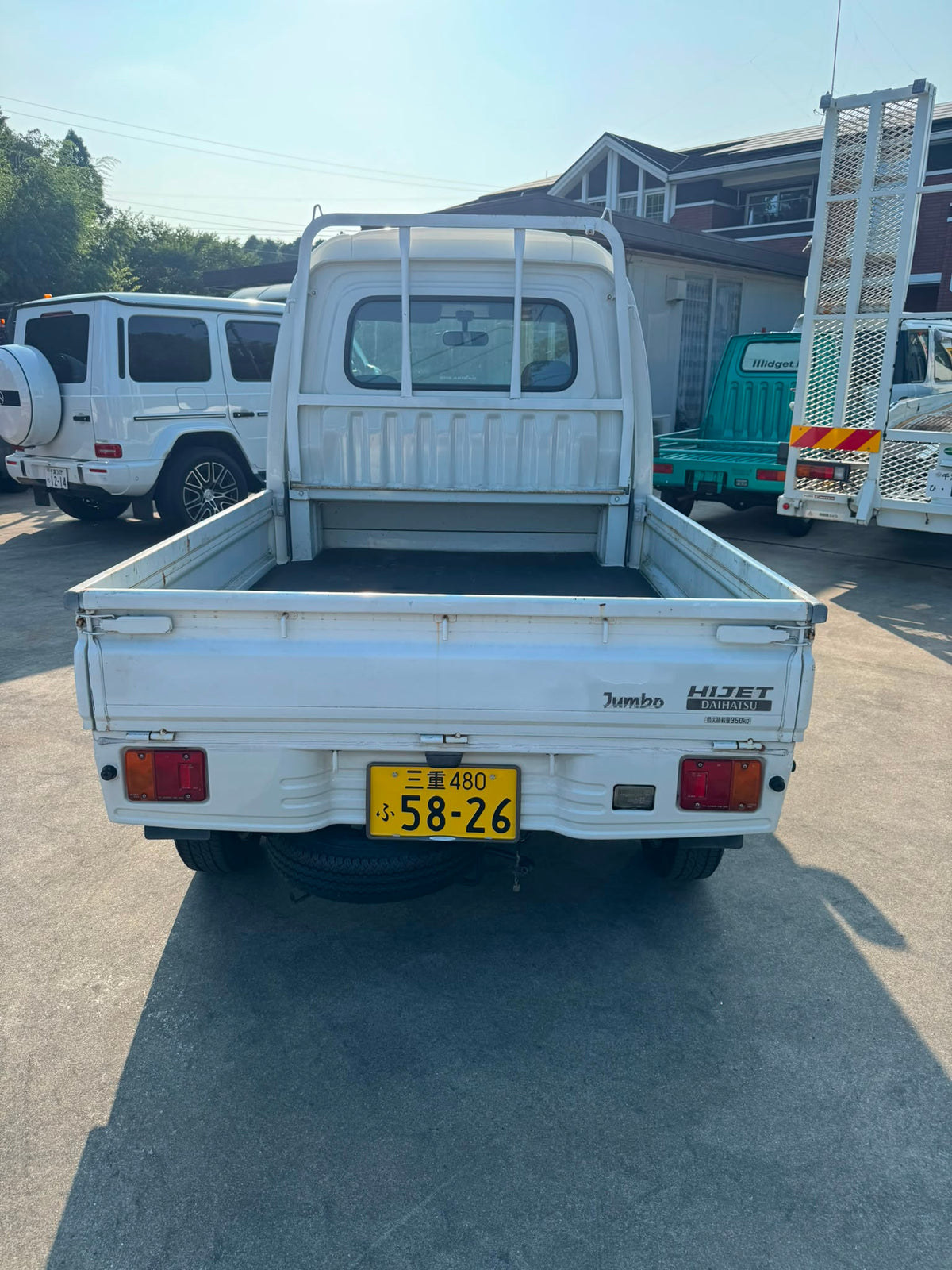 White 2000 Daihatsu Hijet Jumbo 4x4 M/T kei truck, photo 5 of 12