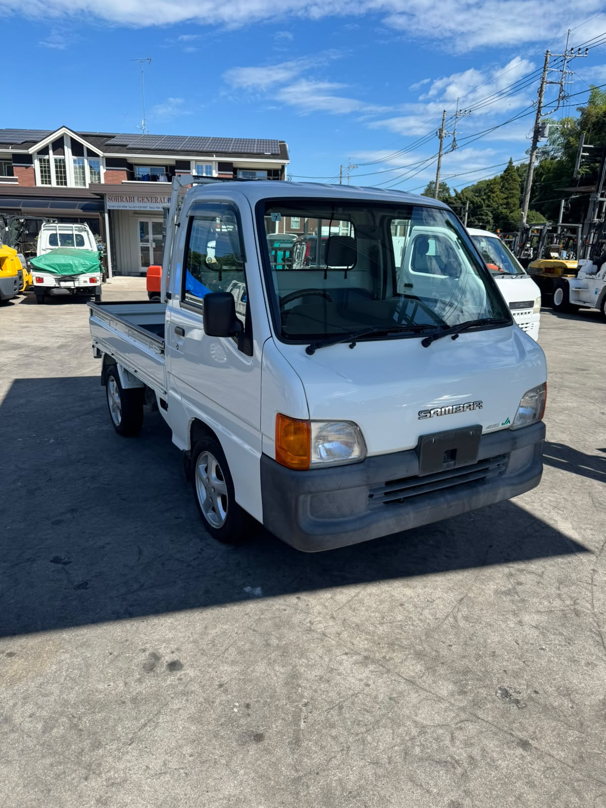 White 2000 Subaru Sambar 4x4 kei truck, photo 1 of 9