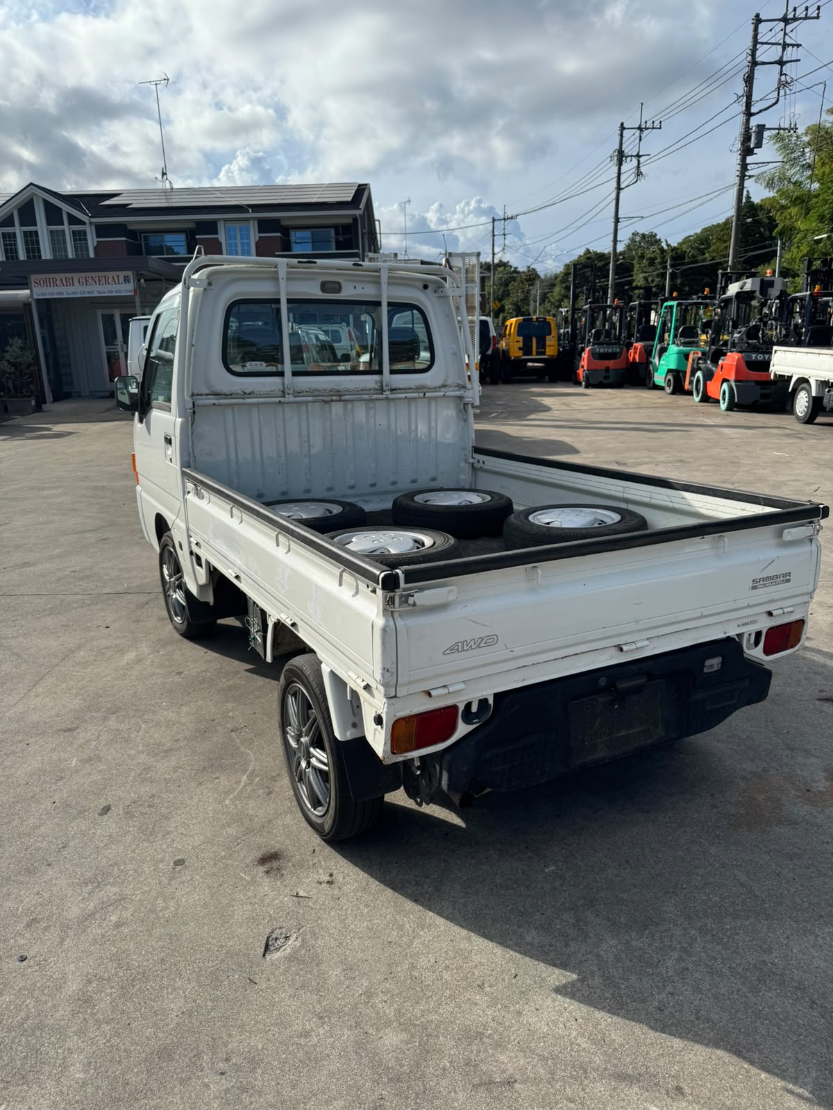 White 2001 Subaru Sambar 4x4 kei truck, photo 4 of 7