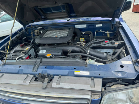 Blue and silver 2000 Isuzu Bighorn Diesel 4WD SUV, photo 12 of 12