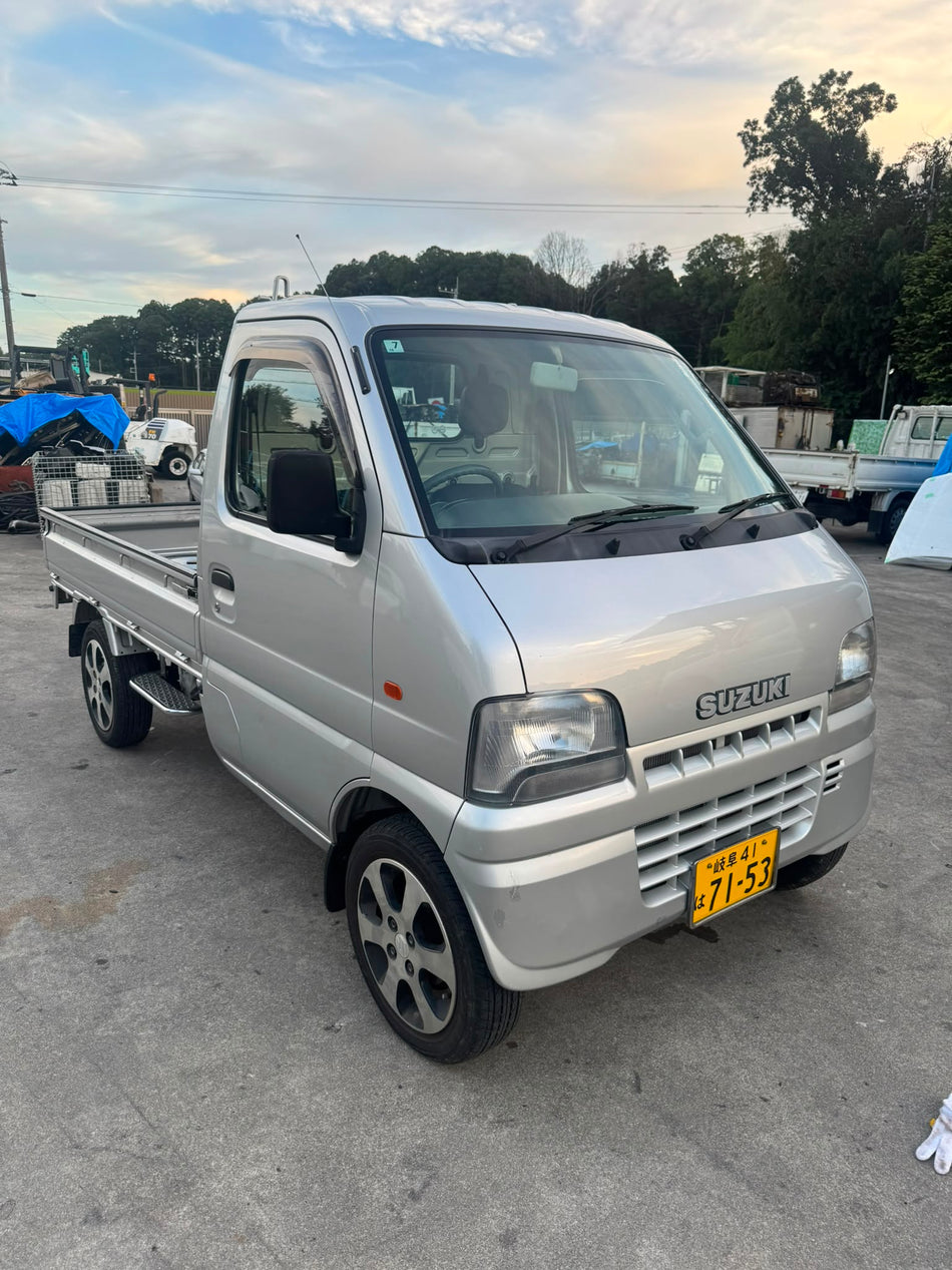 Silver 2000 Suzuki Carry 4x4 kei truck