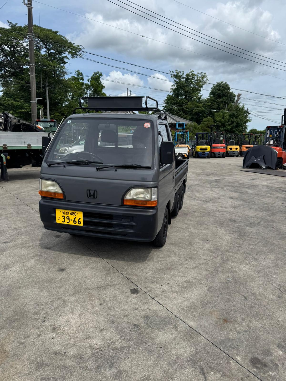 Dark gray 1994 Honda Acty 4x4 kei truck, photo 2 of 11