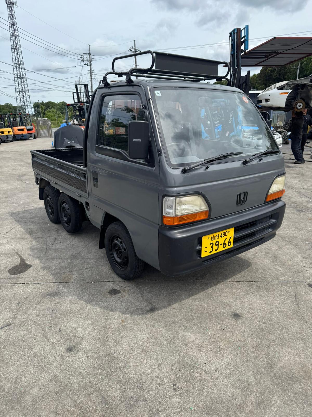 Dark gray 1994 Honda Acty 4x4 kei truck