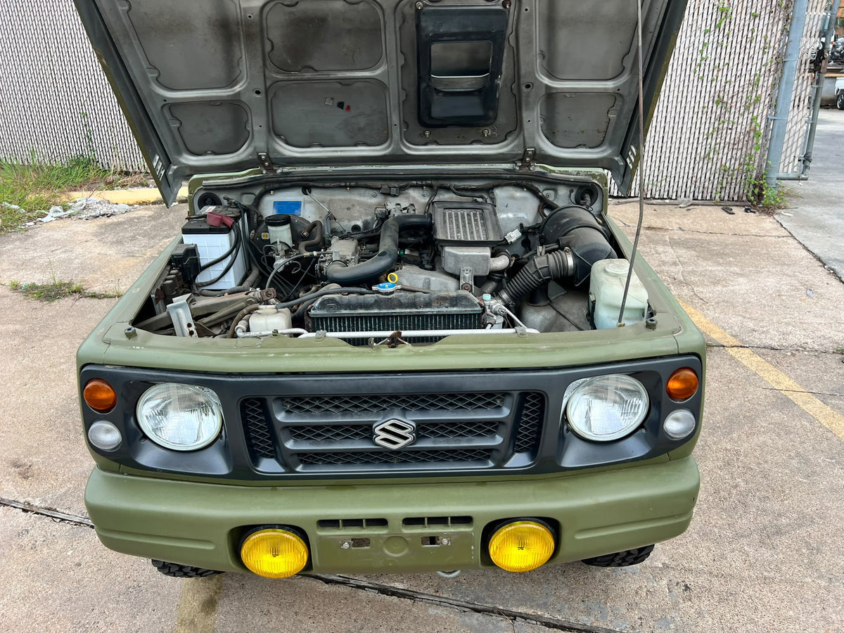 Green 1997 Suzuki Jimny 4x4 kei SUV, photo 12 of 14