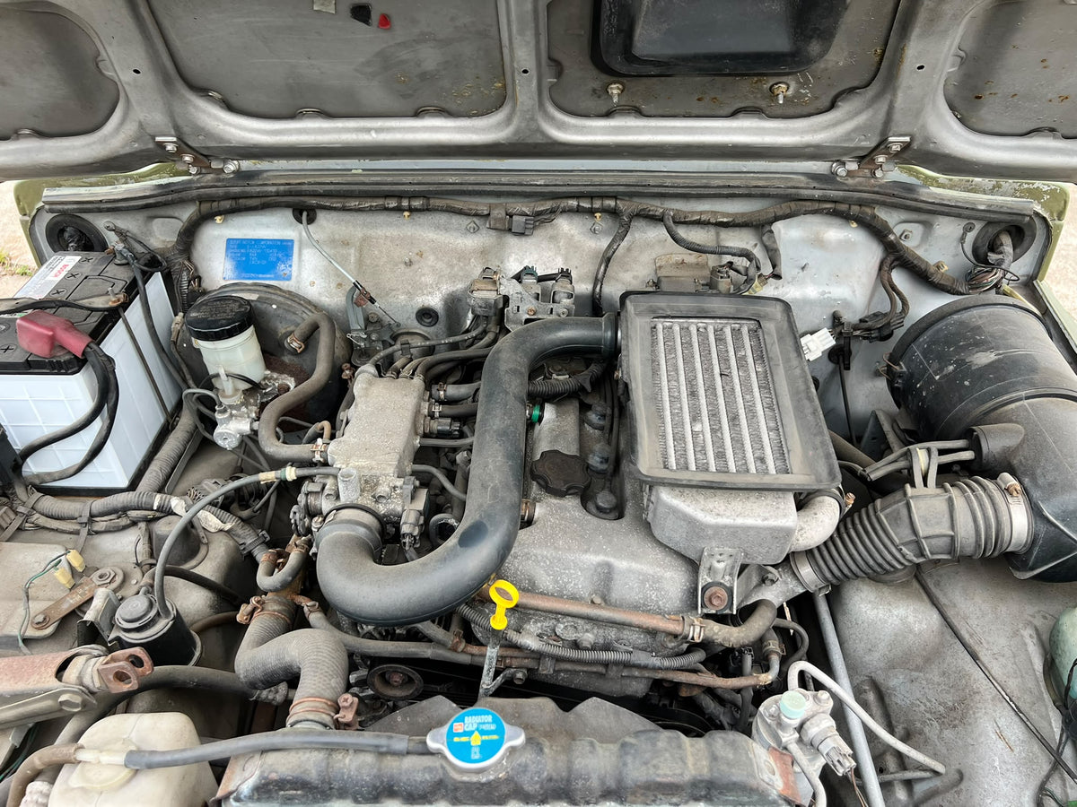 Green 1997 Suzuki Jimny 4x4 kei SUV, photo 13 of 14