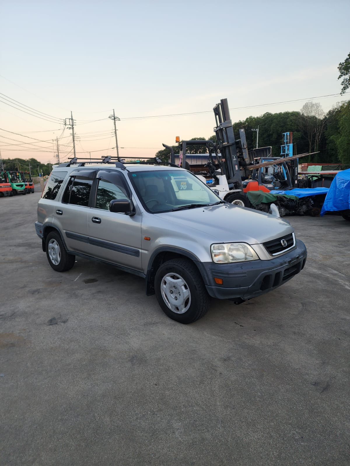 Silver 1997 Honda CR-V 4WD SUV, photo 1 of 19