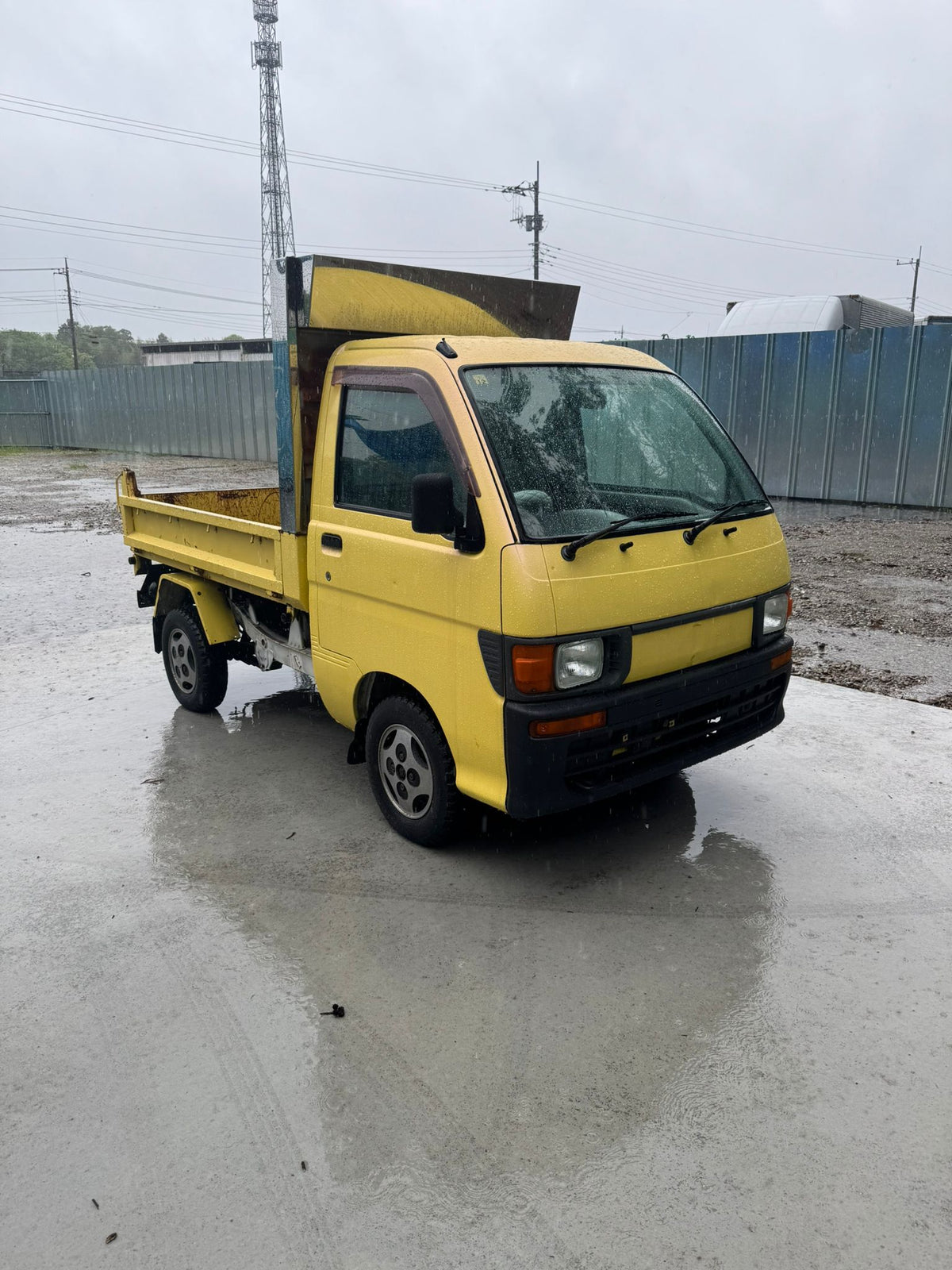 Yellow 1997 Daihatsu Hijet Dump Truck 4x4, photo 3 of 11