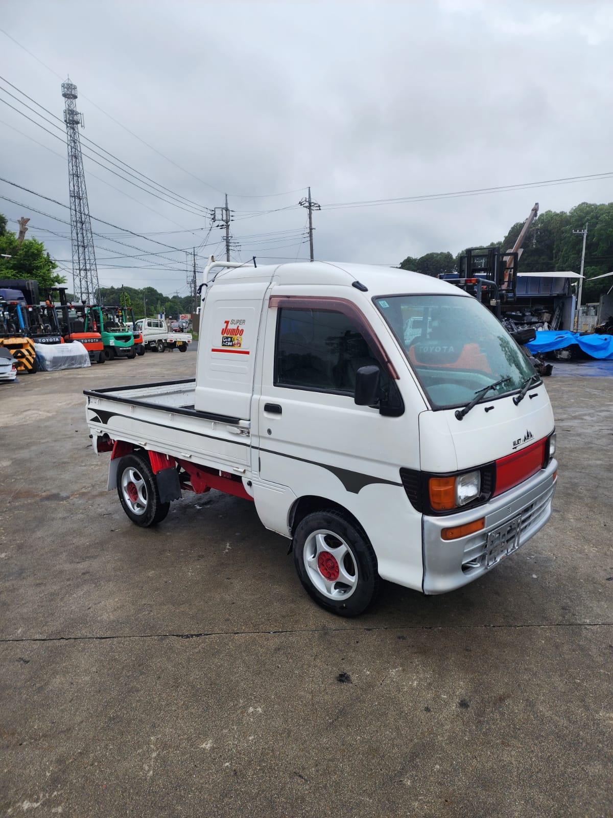 White 1998 Daihatsu Hijet Jumbo 4x4 kei truck, photo 1 of 16