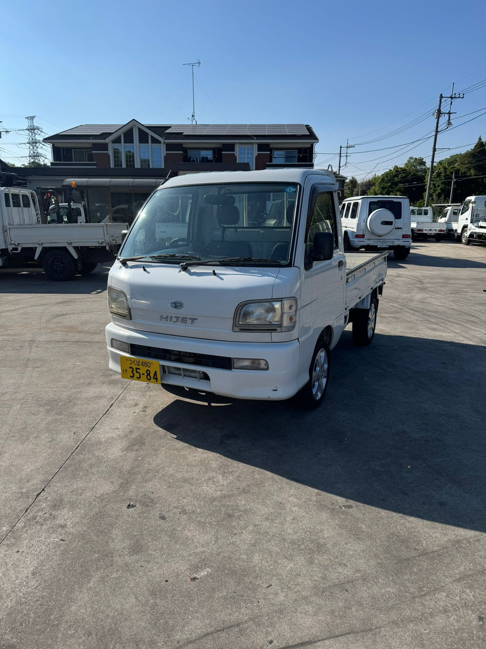 White 2000 Daihatsu Hijet 4x4 kei truck, photo 1 of 12