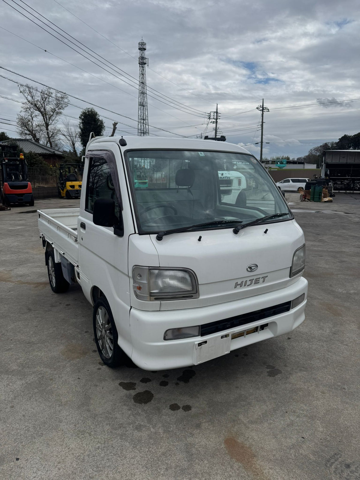 White 2001 Daihatsu Hijet 4x4 kei truck, photo 1 of 13