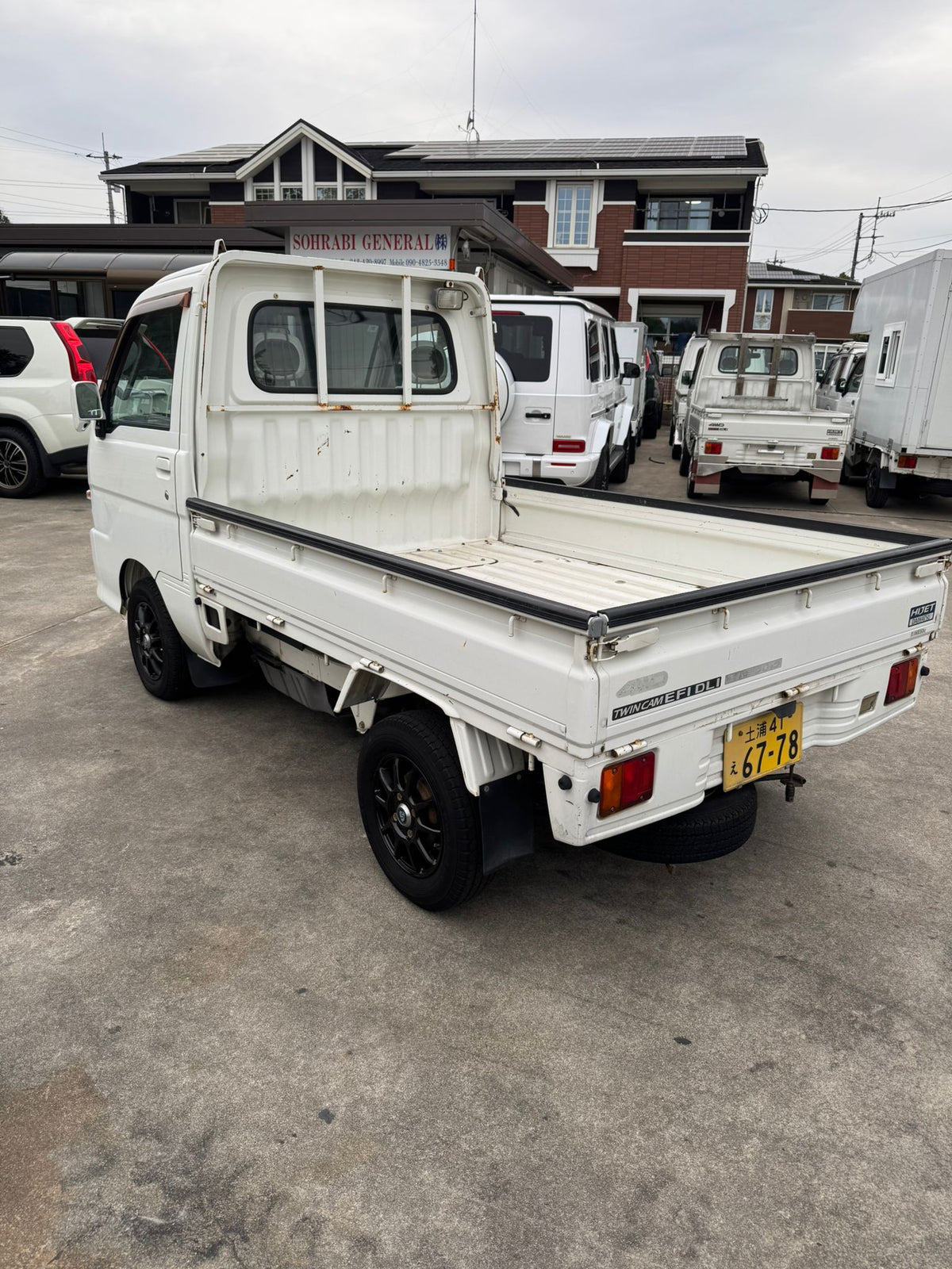 White 2001 Daihatsu Hijet 4x4 kei truck, photo 4 of 13
