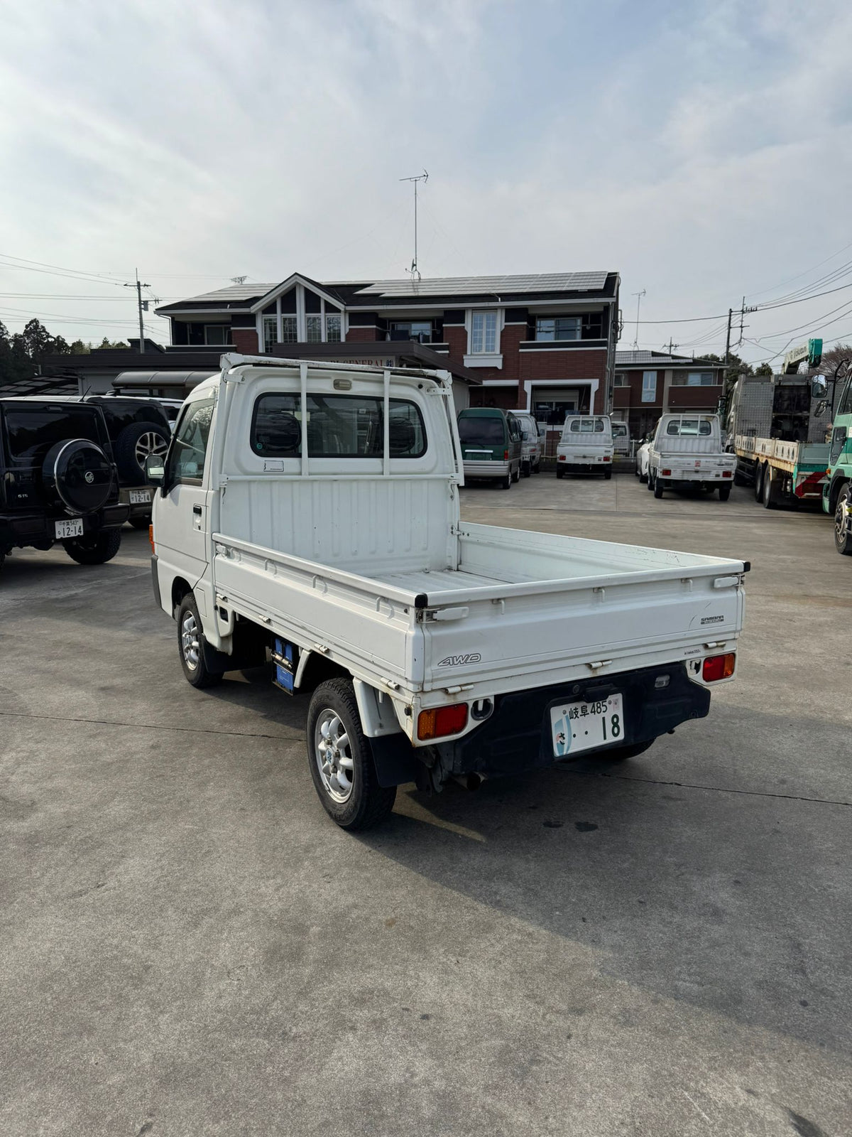 White 2000 Subaru Sambar 4x4 kei truck, photo 4 of 14
