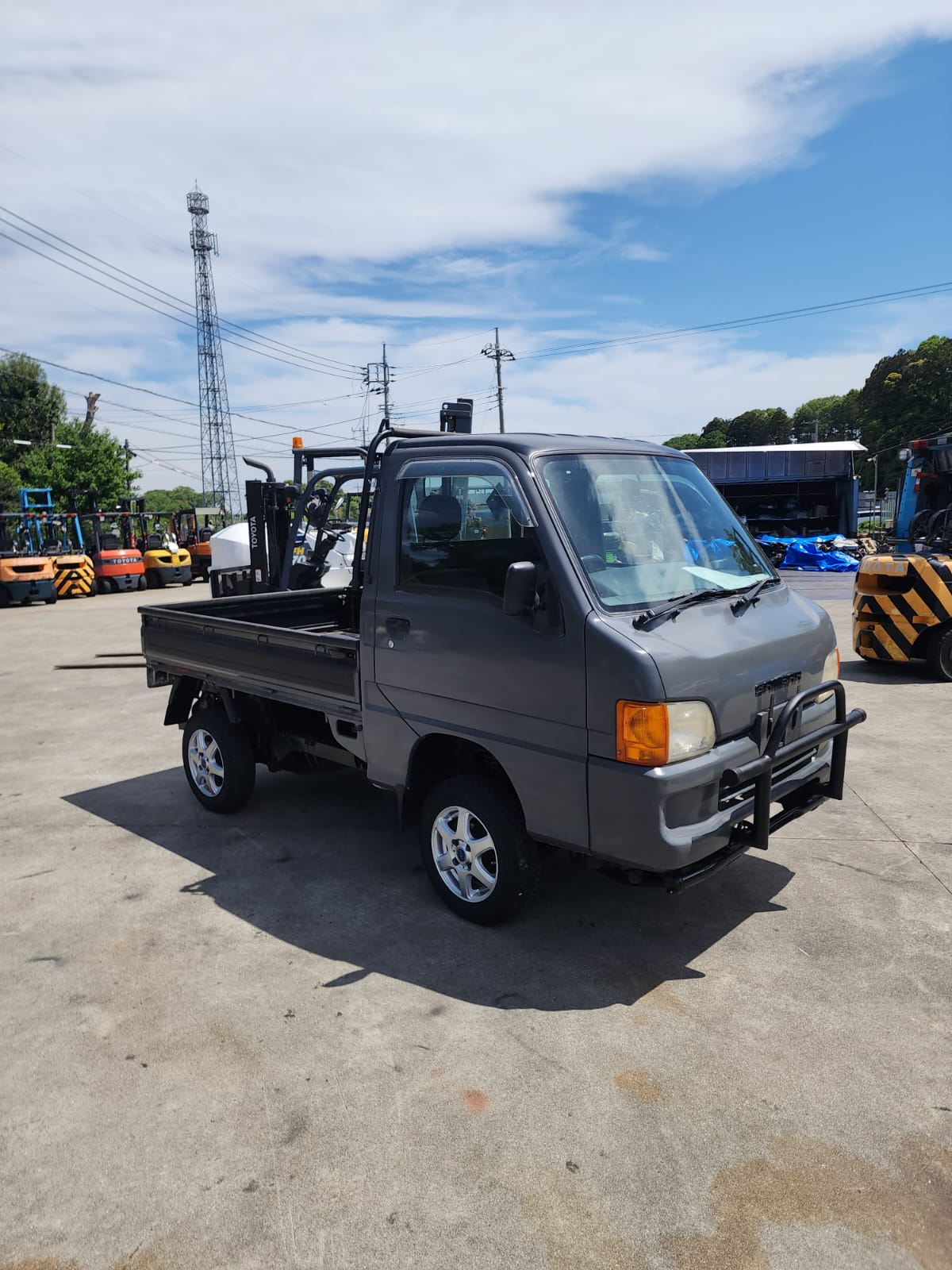 Gray 2001 Subaru Sambar 4x4 kei truck, photo 1 of 15