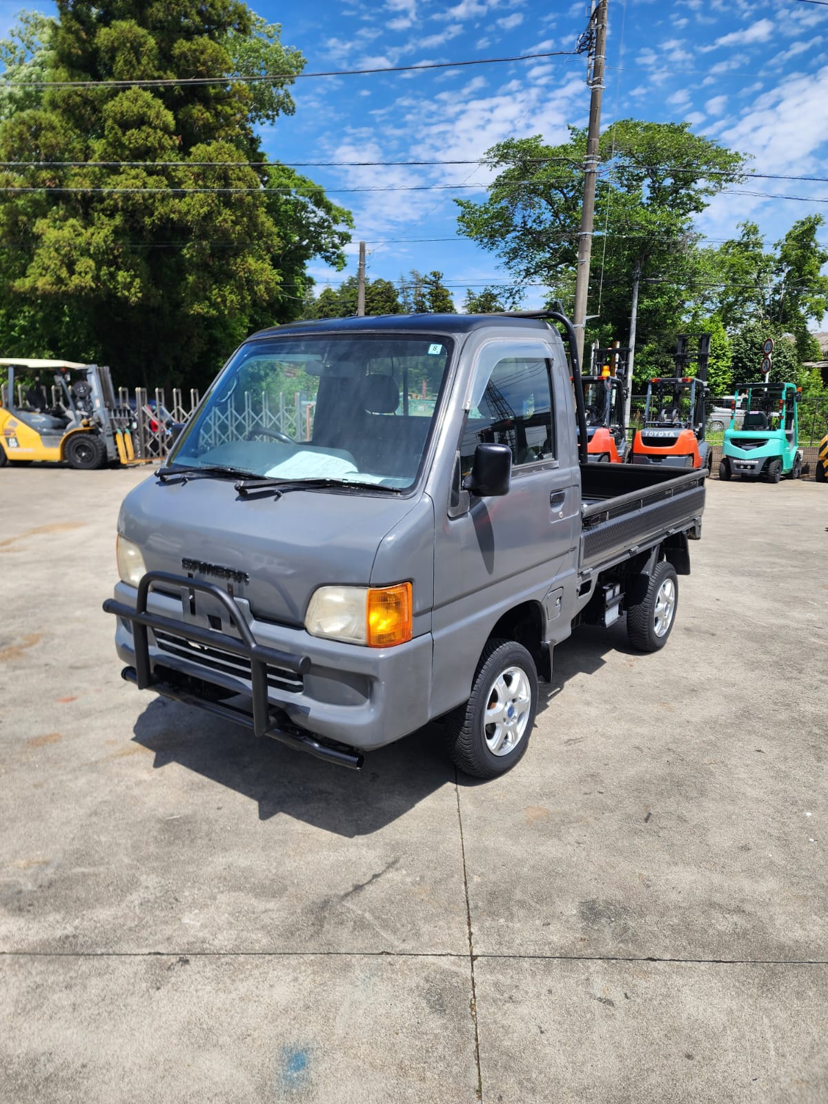 Gray 2001 Subaru Sambar 4x4 kei truck, photo 2 of 15