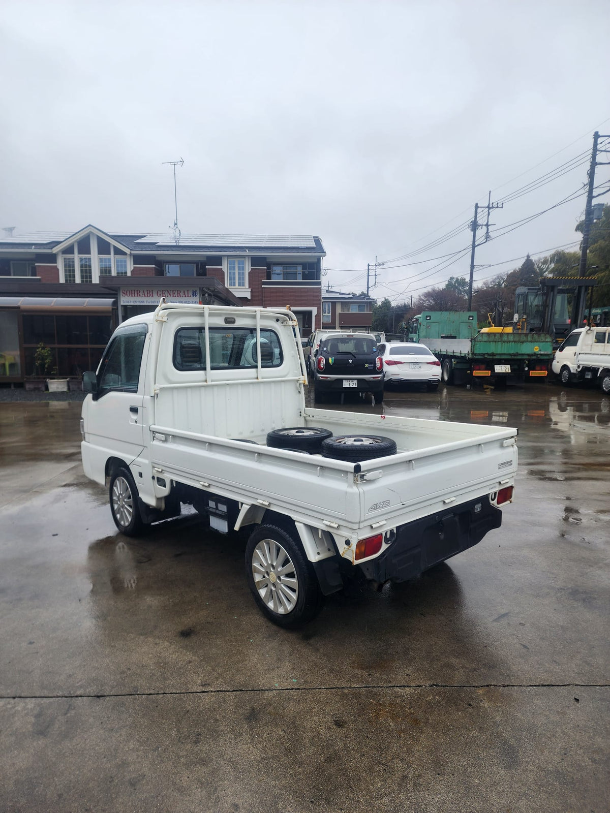 White 2001 Subaru Sambar 4x4 kei truck, photo 2 of 16
