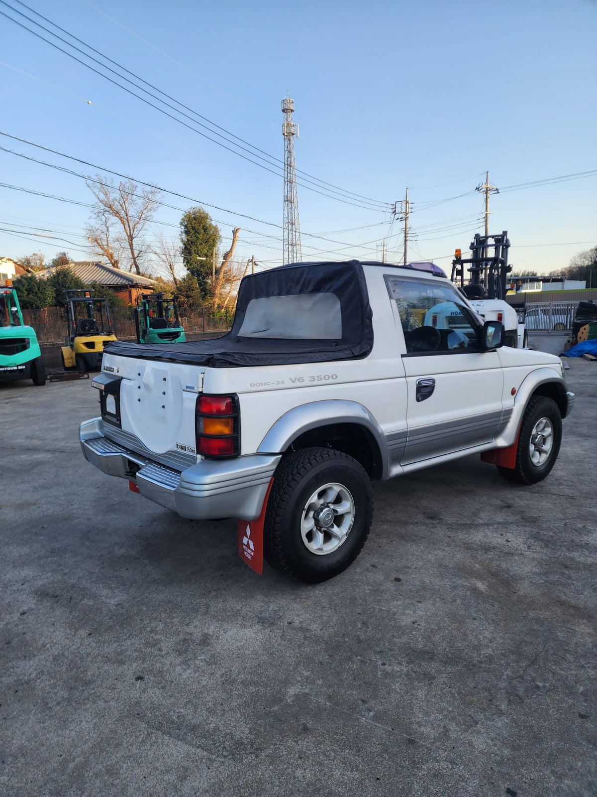 White and silver 1996 Mitsubishi Pajero Canvas Top 4WD SUV, photo 2 of 24