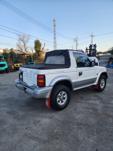White and silver 1996 Mitsubishi Pajero Canvas Top 4WD SUV, photo 2 of 24