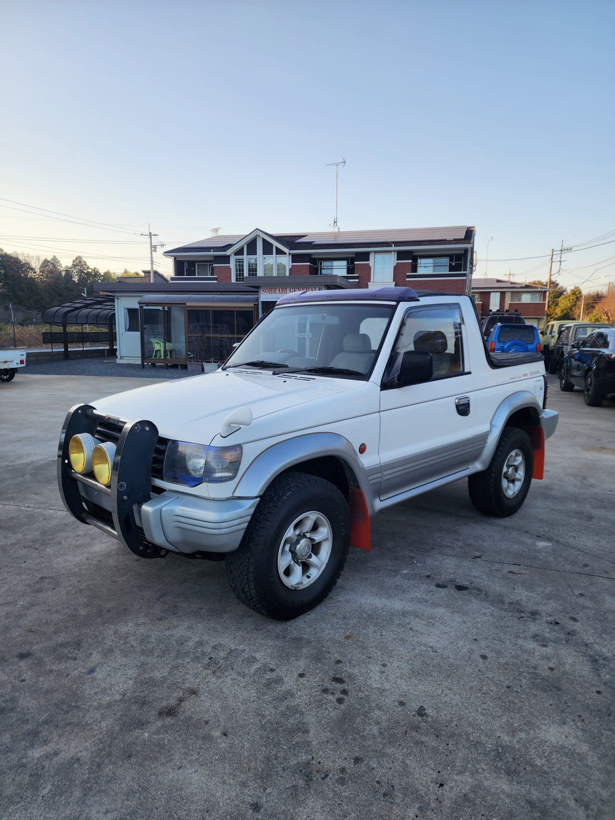White and silver 1996 Mitsubishi Pajero Canvas Top 4WD SUV, photo 4 of 24