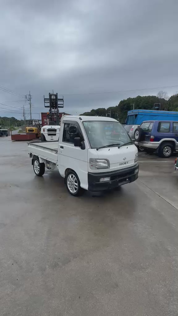 White 1999 Daihatsu Hijet 4x4 kei truck, video
