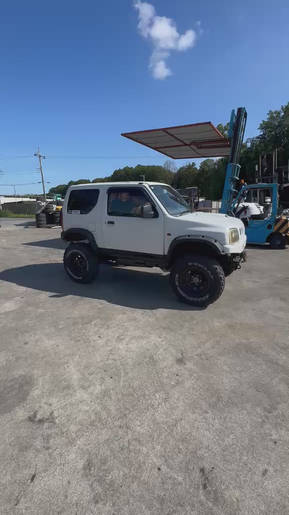 White 1998 Suzuki Jimny 4x4 kei SUV, video