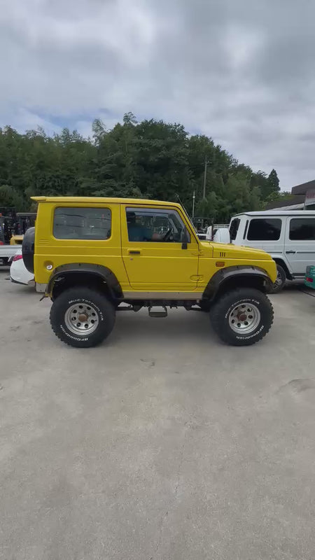 Yellow 1997 Suzuki Jimny Sierra 4x4 kei SUV, video
