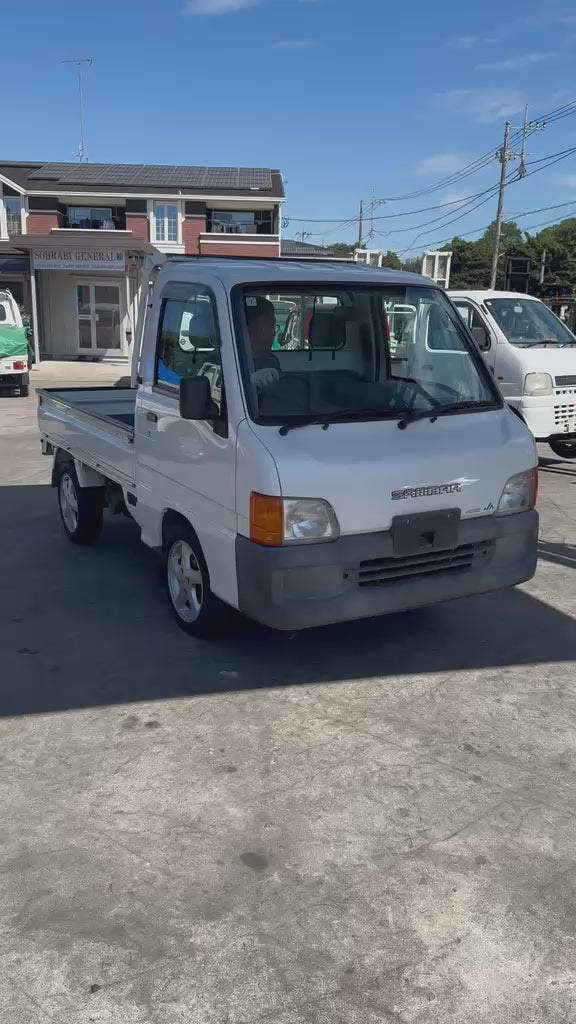 White 2000 Subaru Sambar 4x4 kei truck, video