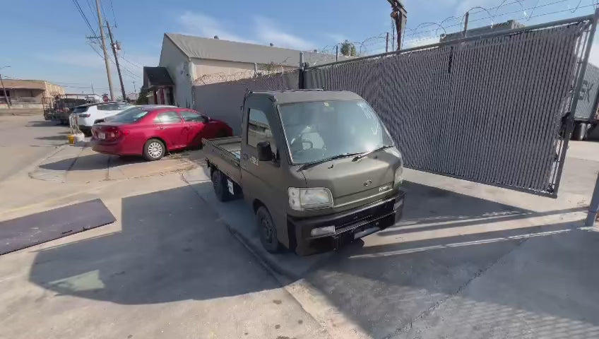 Green 1999 Daihatsu Hijet 4x2 kei truck, video