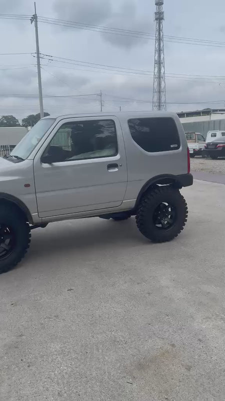 Silver 2000 Suzuki Jimny 4x4 kei SUV, video